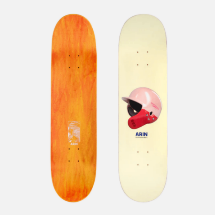Two skateboard decks, one orange with a logo and one beige with a helmet design, on a white background.
