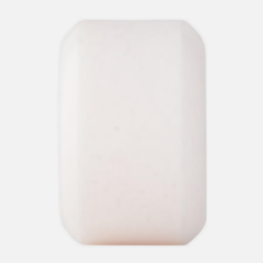 Rectangular white skateboard wheel on a light gray background